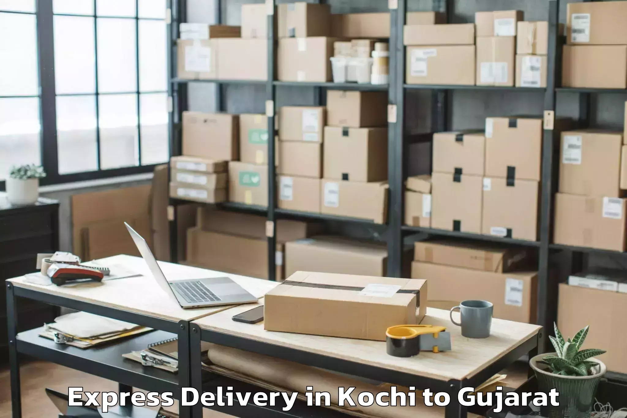 Book Kochi to Abhilashi University Rajkot Express Delivery Online